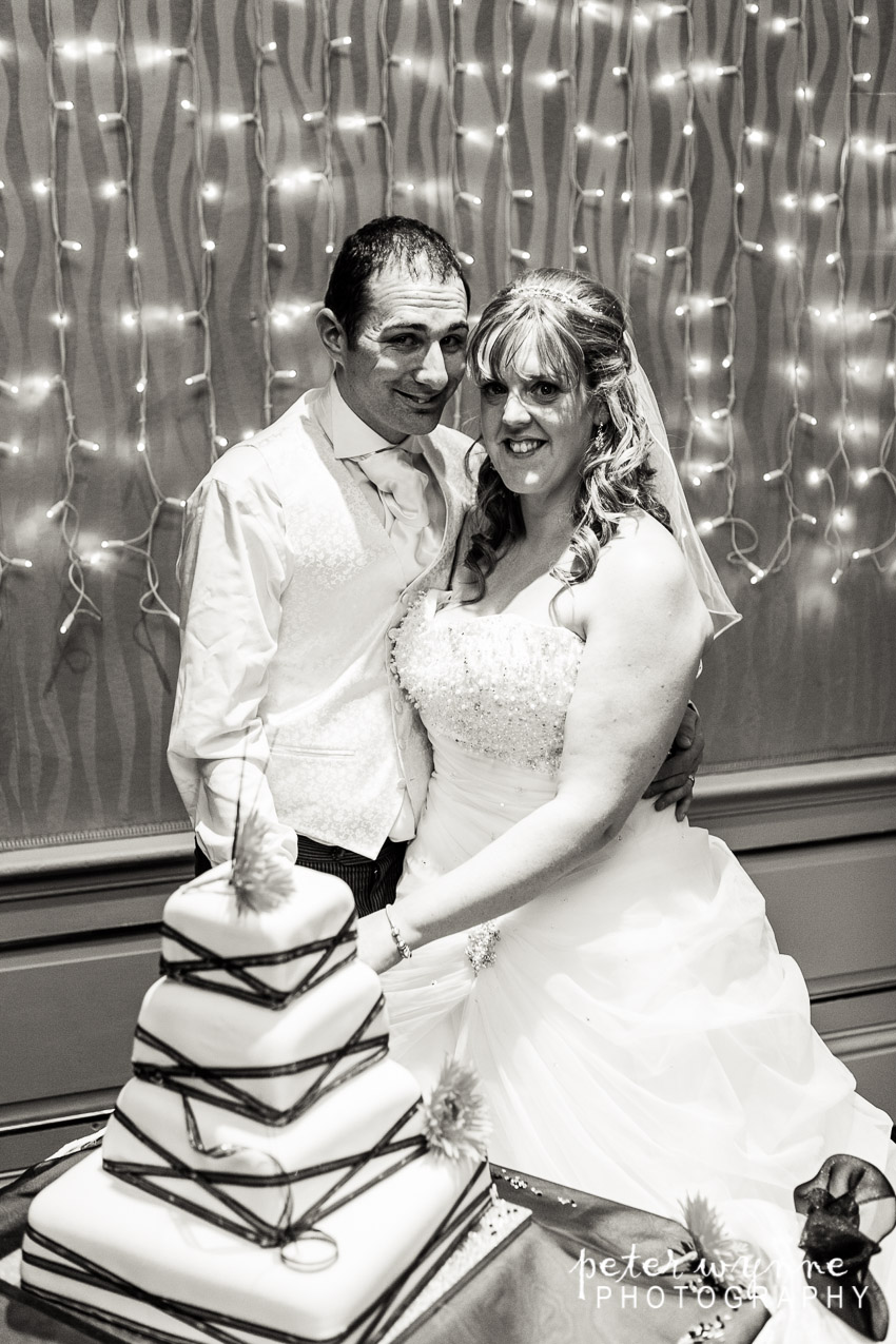 Bride & groom cut cake