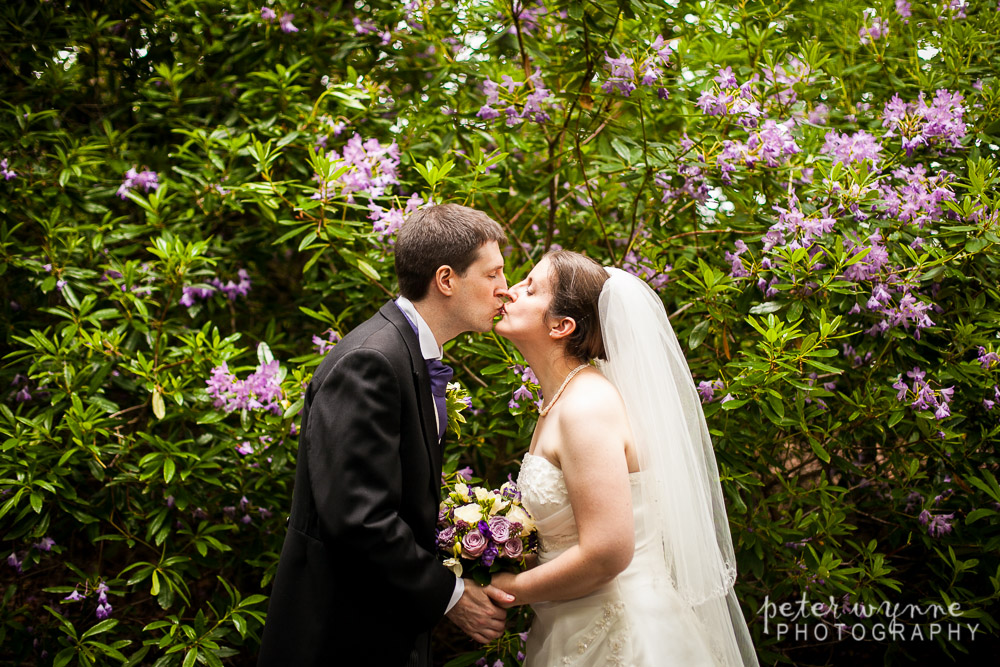 Bride & groom kiss