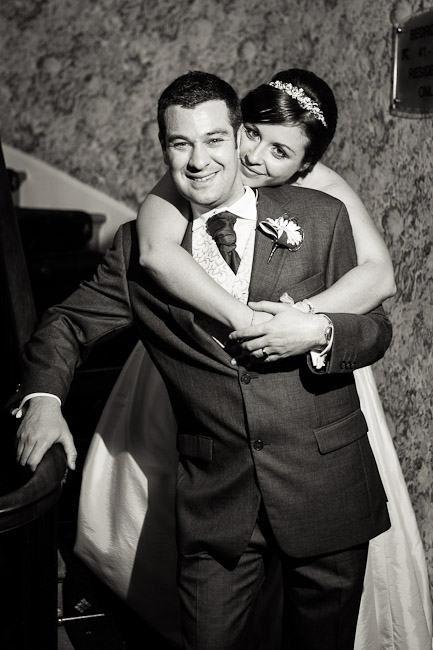 Bride and groom embracing