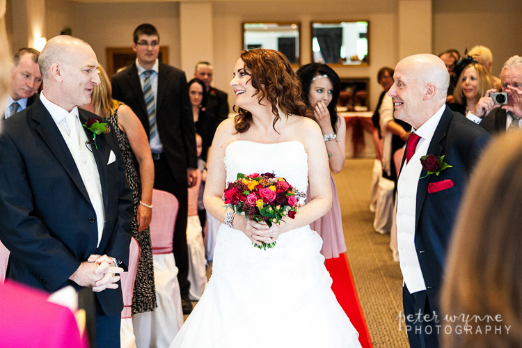 Groom waiting at ceremony