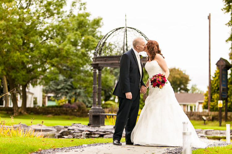 Bride and groom kissing