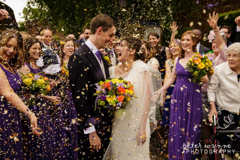 Confetti thrown over bride and groom