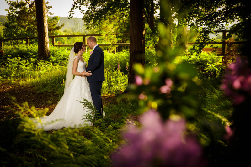 bride and groom in woods at abbeywood estate