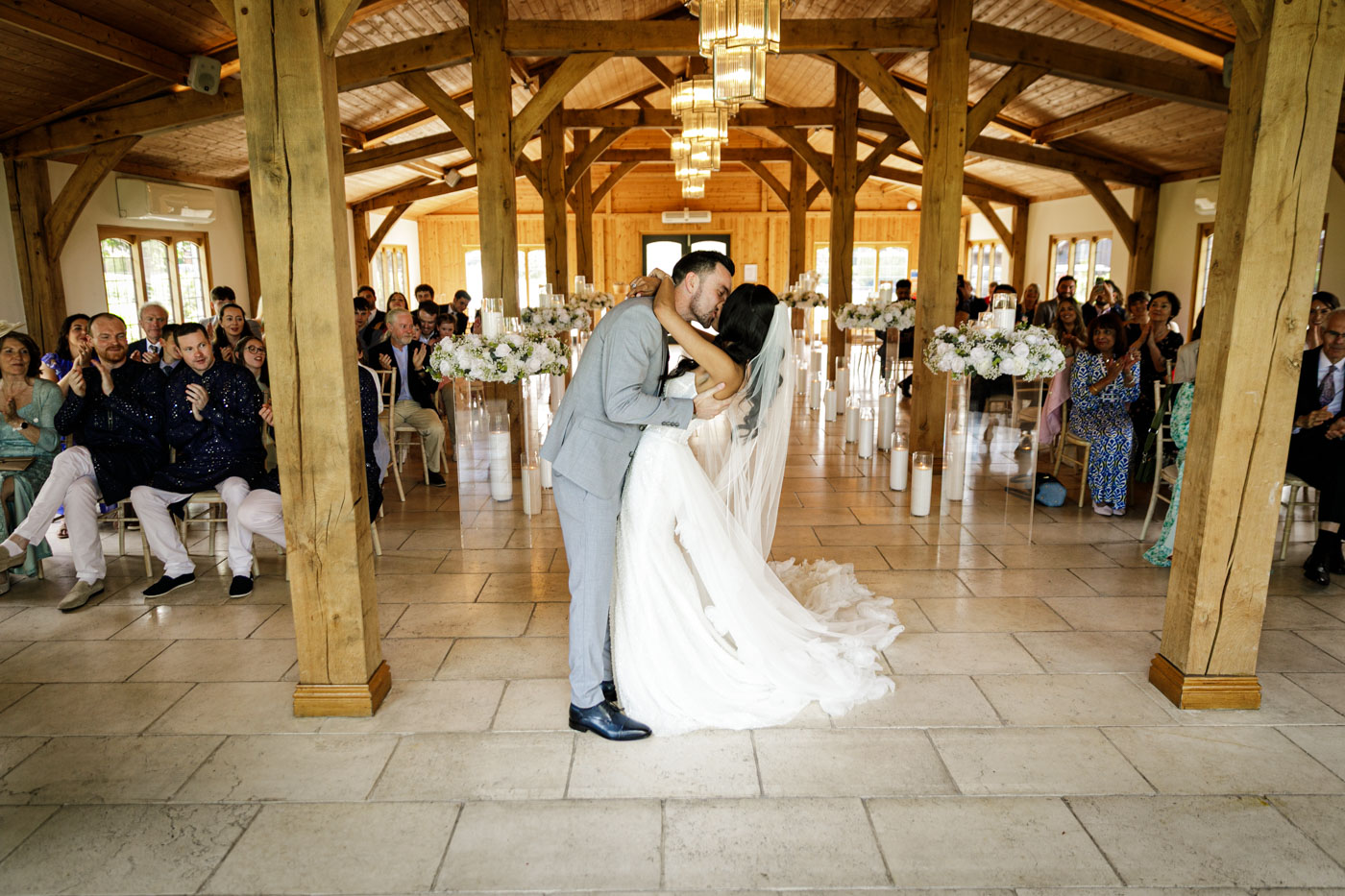 bride and groom kiss after ceremony at colshaw hall