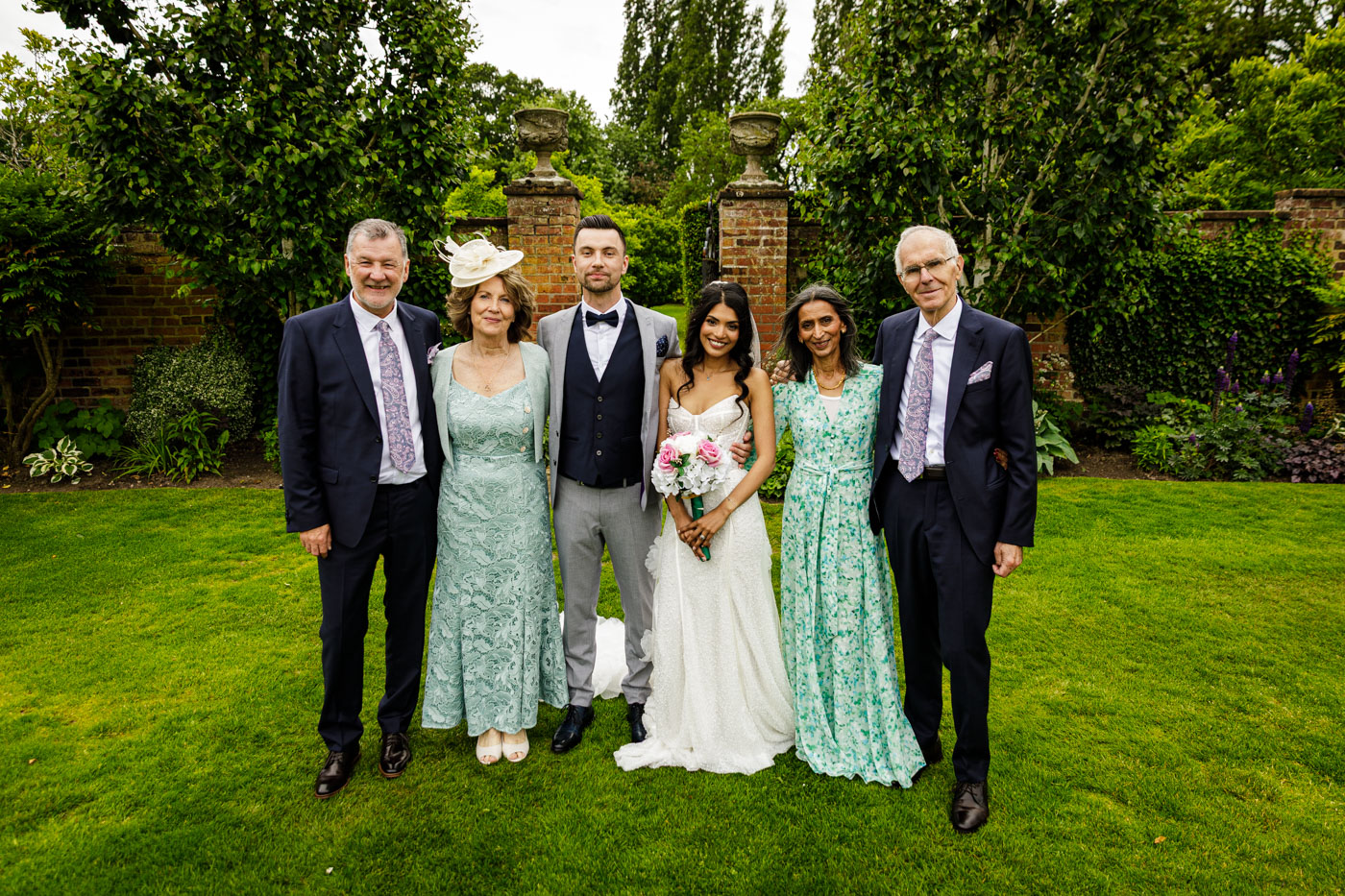 group photo in gardens at colshaw hall