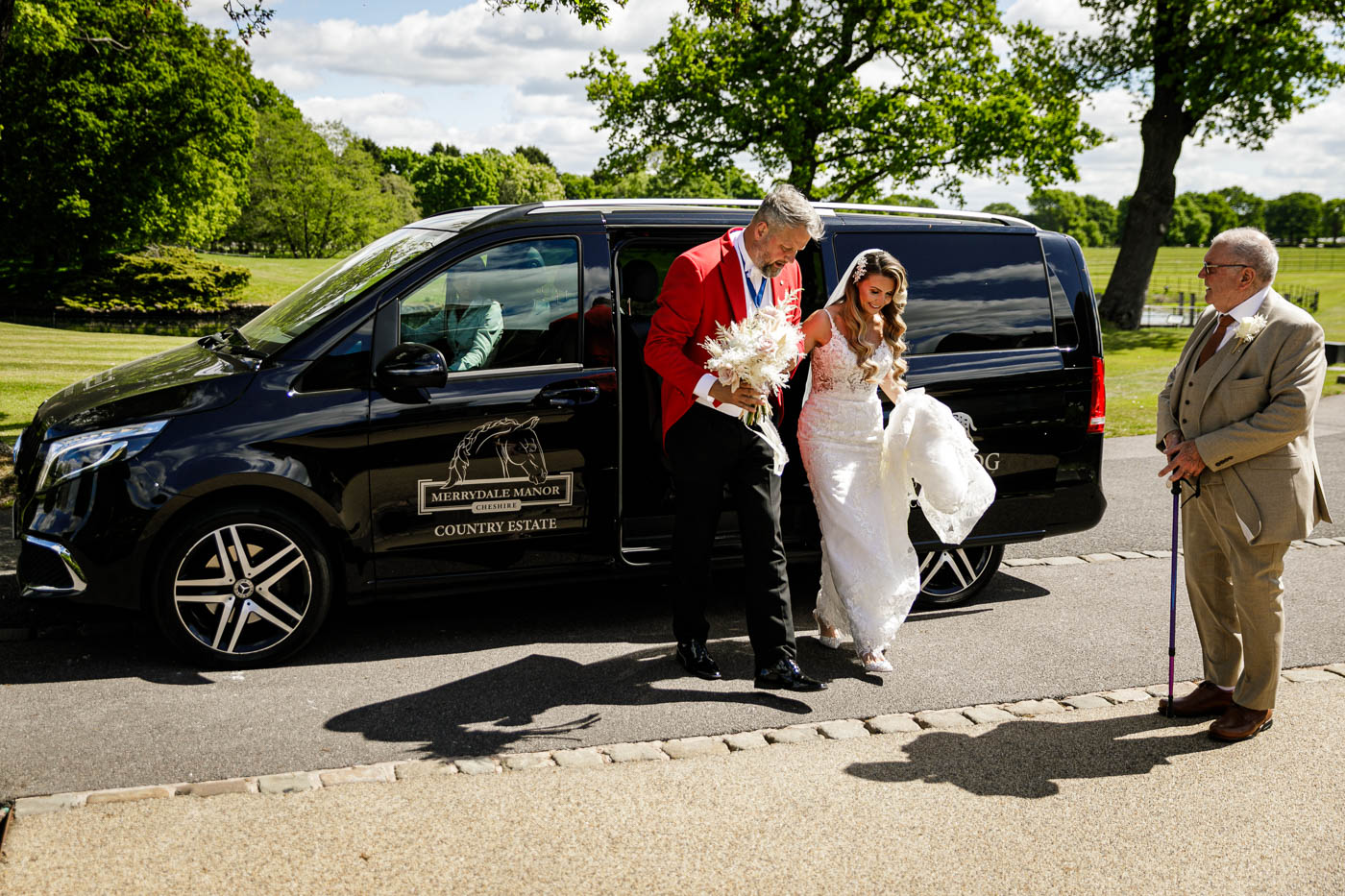 bride being helped getting out of van