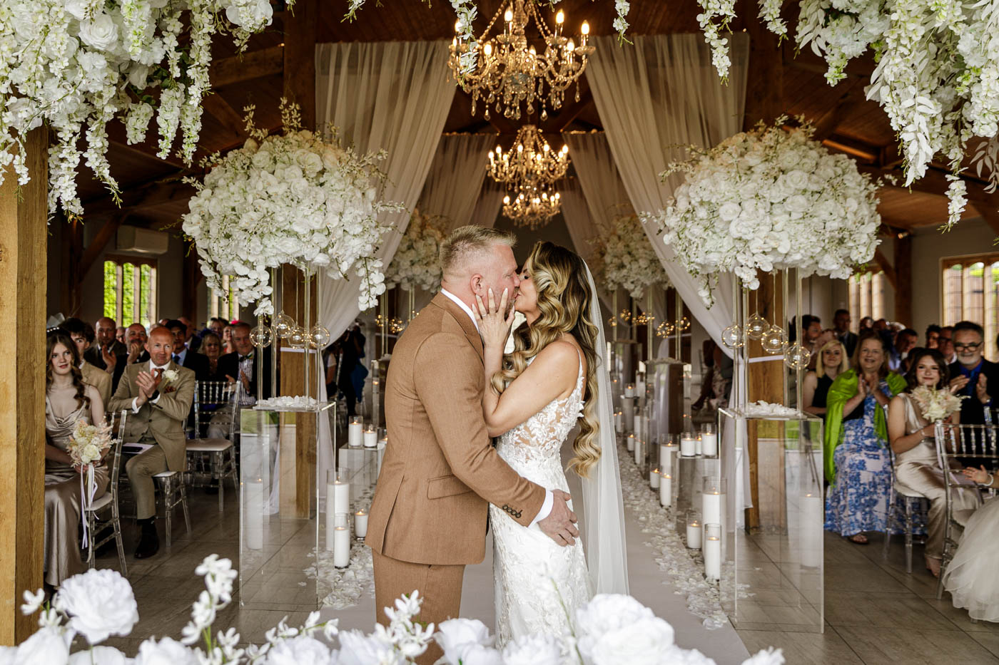 bride and groom first kiss at merrydale manor