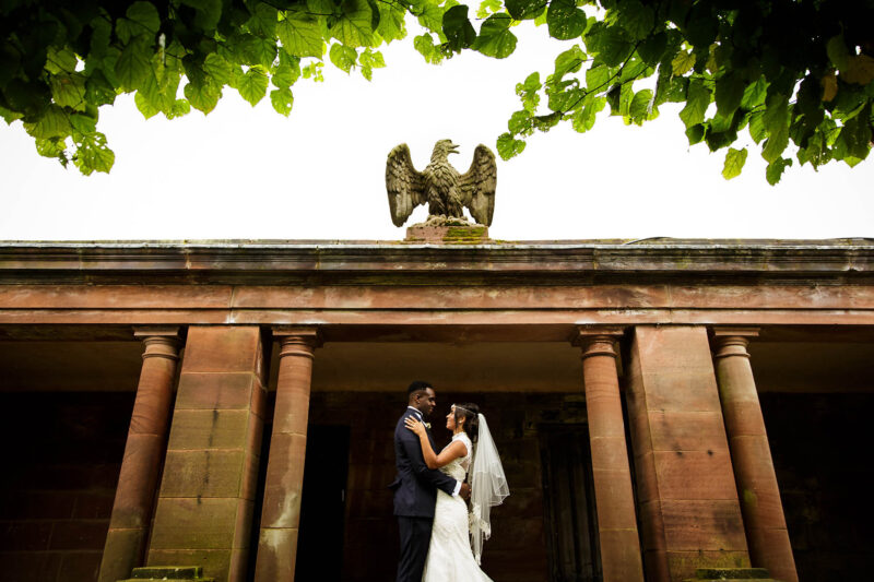 Bride and groom embracing at Thornton Manor