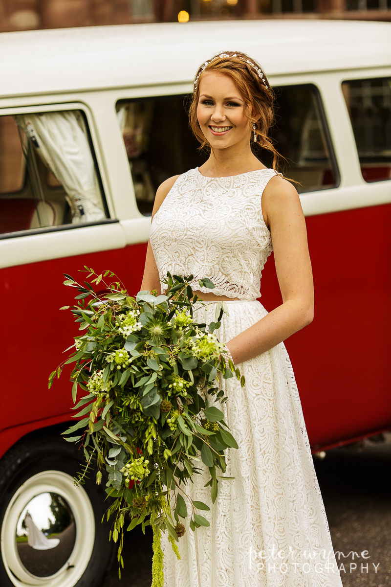 Bridal portrait in front of camper van at Wrenbury Hall